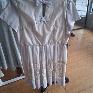 Elegant White Dress with Bow Detail